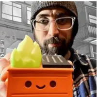 Jared showing one piece from his dumpster fire collection